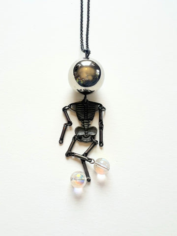 Mended Veil: Self-Reflecting Skeleton Necklace